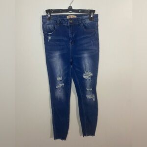 Elite Jeans 7/28 distressed skinny jeans.